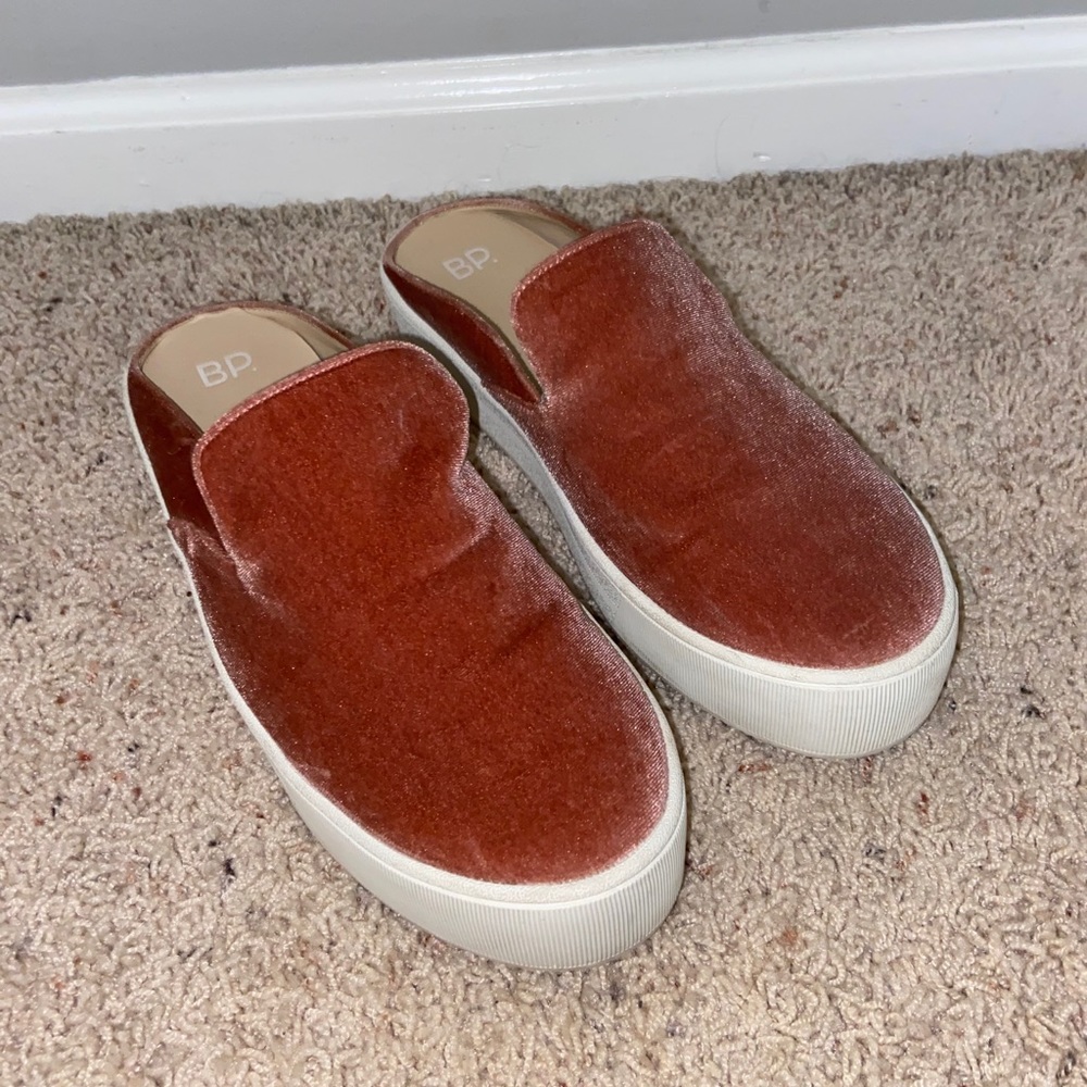 Pink suede hightop shoes